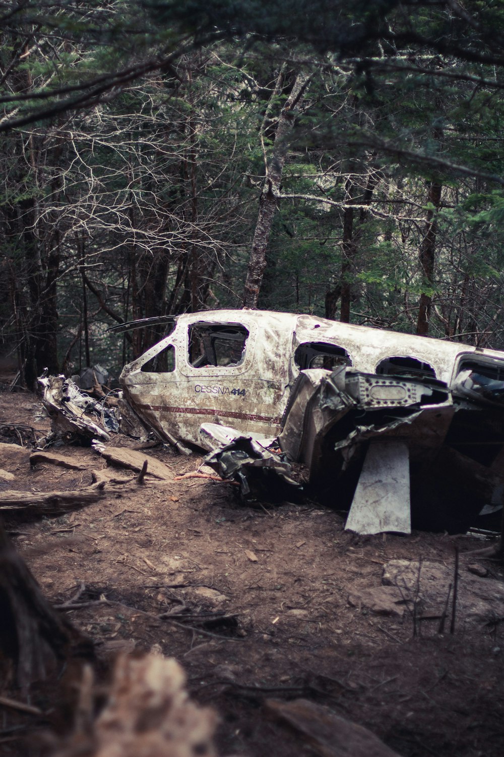 a car that is sitting in the dirt