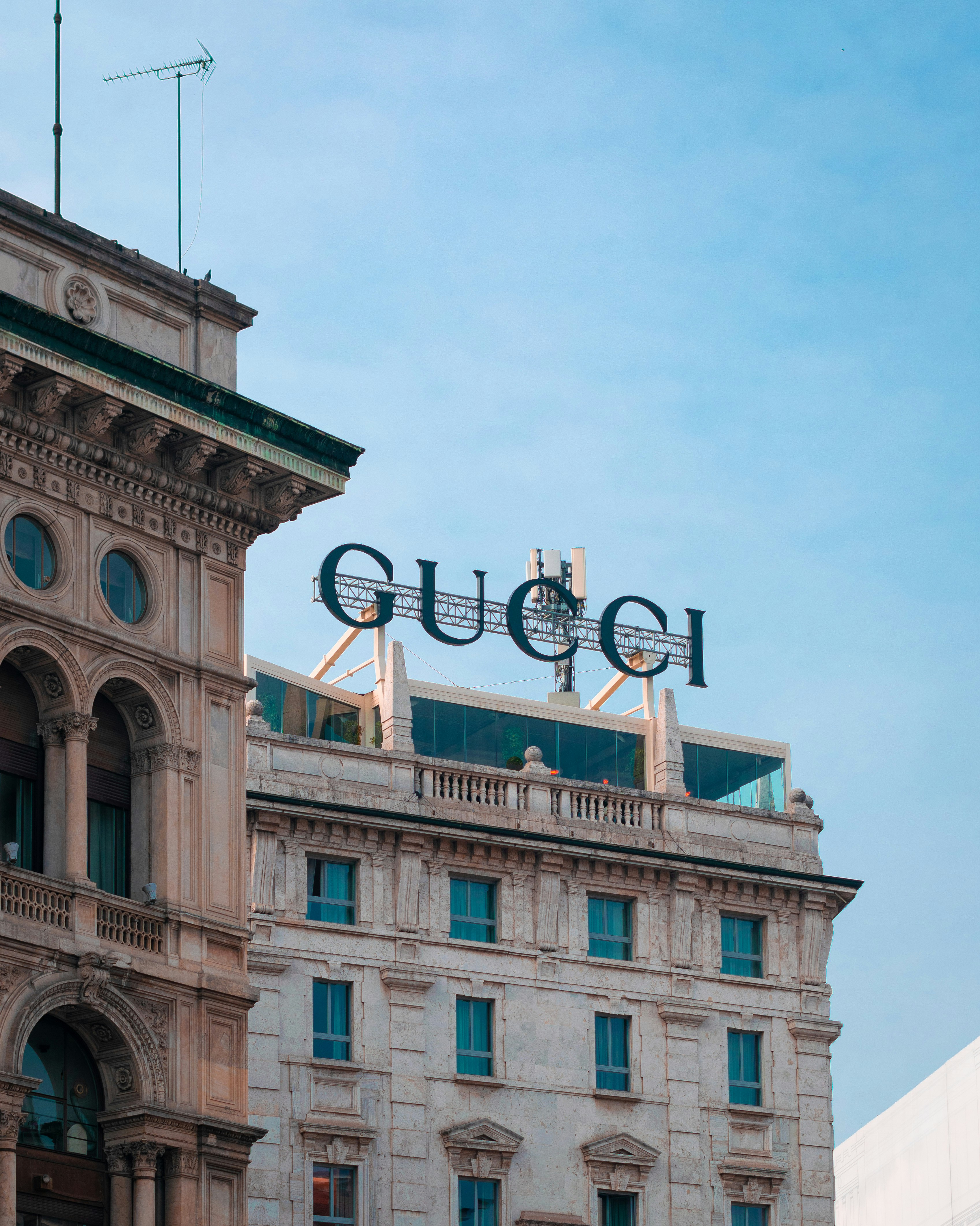 Gucci sign on top of a building in Milan, Italy.