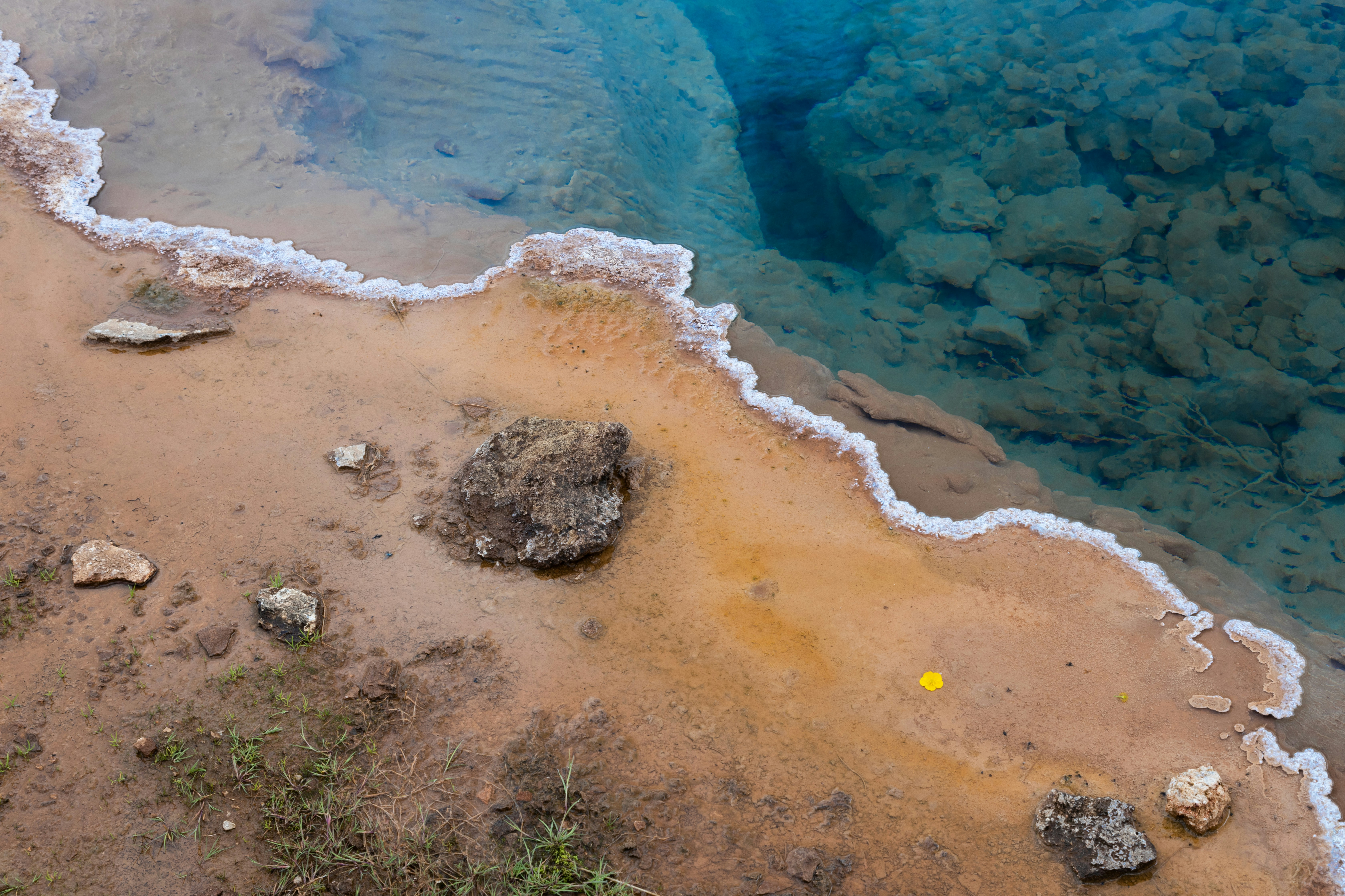 a body of water that has some rocks in it