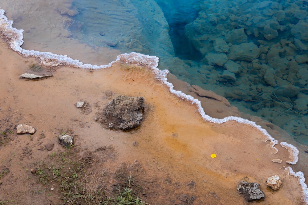 a body of water that has some rocks in it