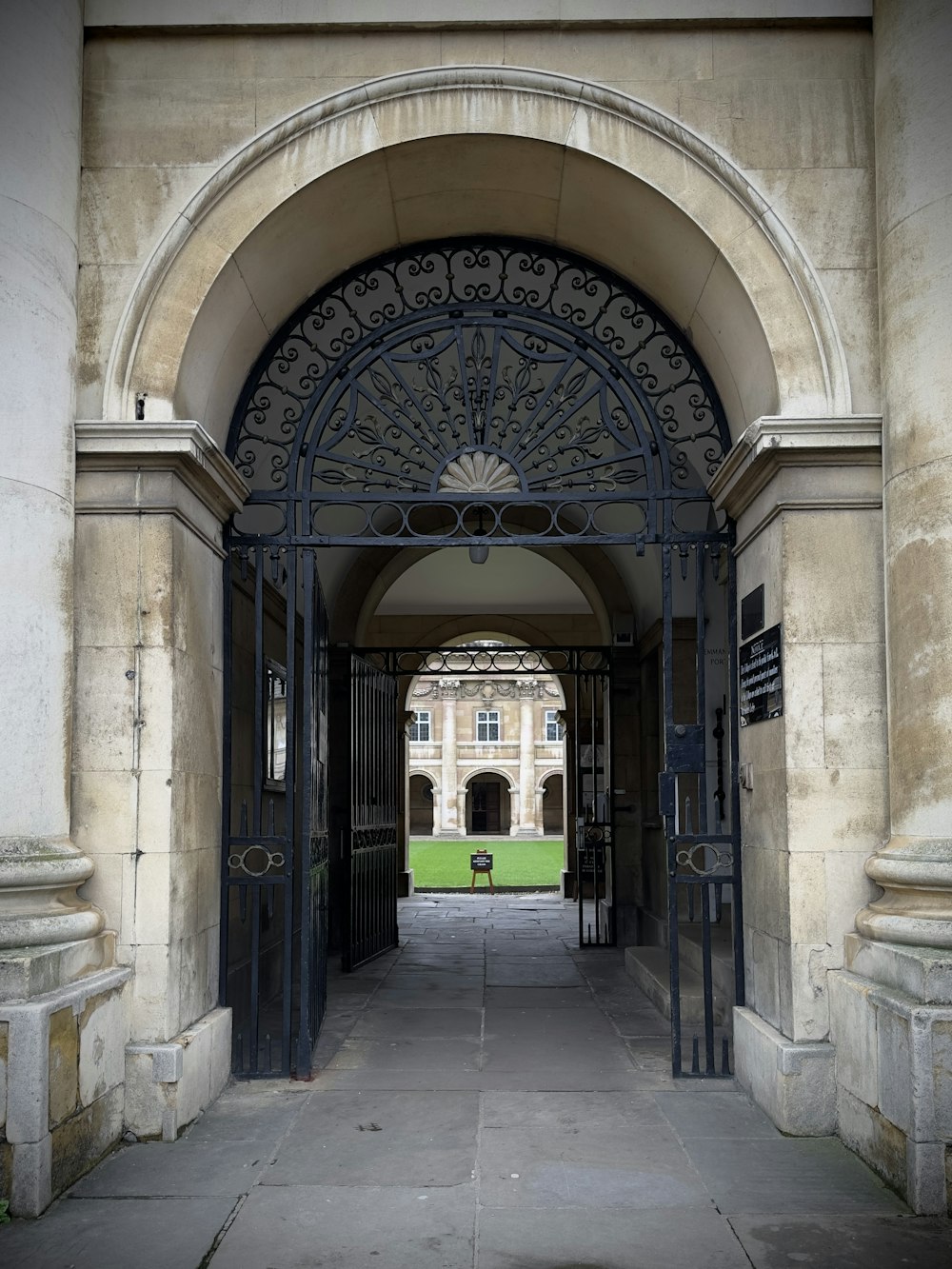 a large building with a large iron gate