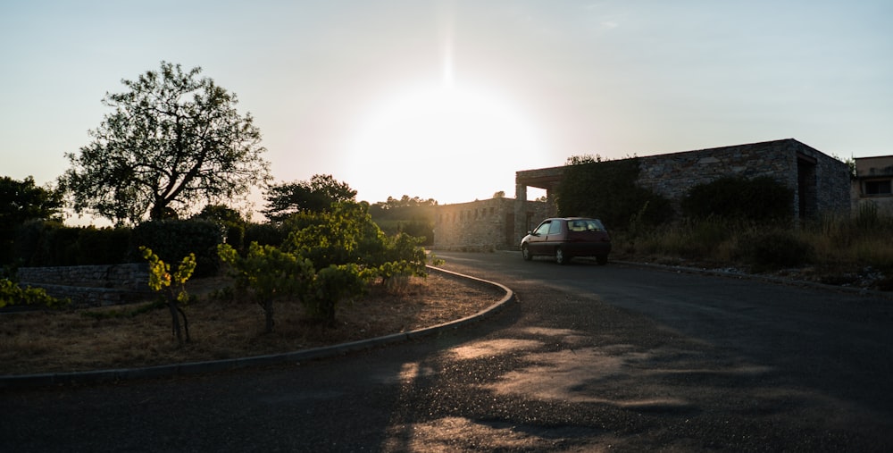 a car is driving down a winding road