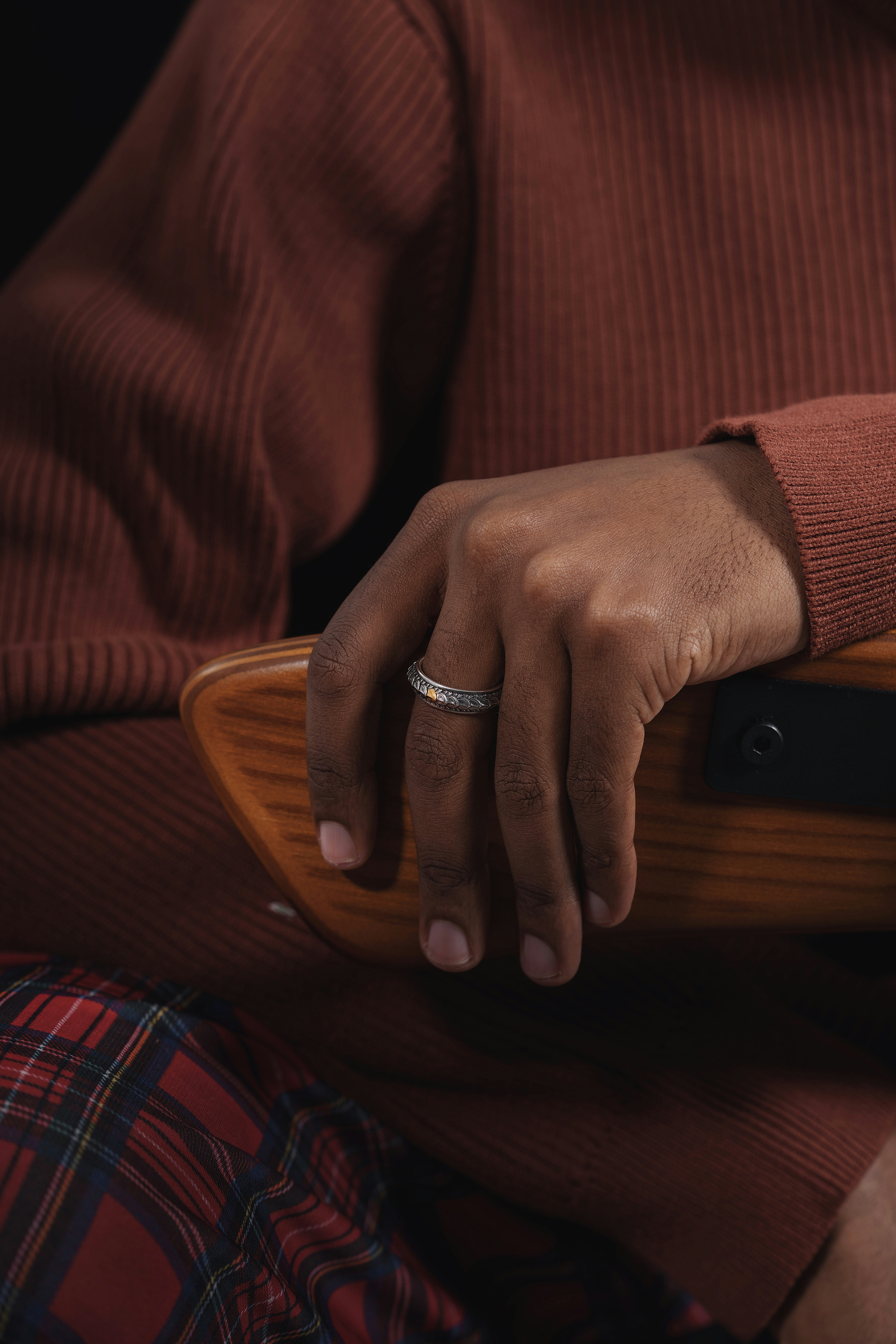 a person with a ring on their finger