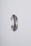An intricately designed silver ring featuring a textured scale-like pattern and a central gold accent. The ring appears suspended against a plain, light grey background, highlighting its ornate craftsmanship and metallic sheen.