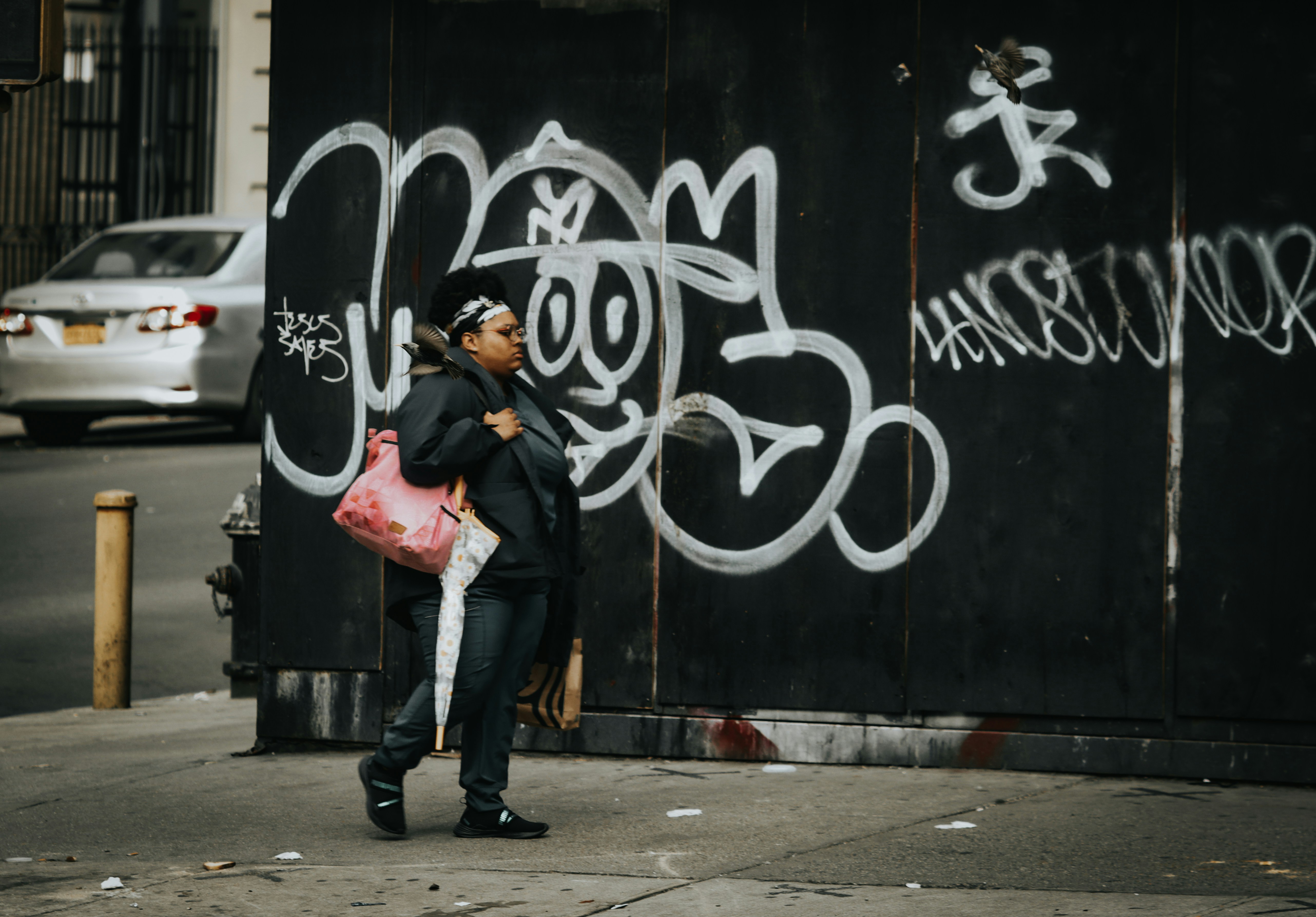 Rooftop urban fashion photoshoot with city skyline