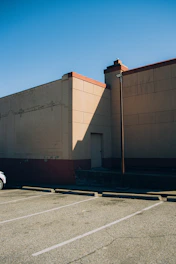 Secure on-site parking lot with well-marked spaces near the hotel entrance.