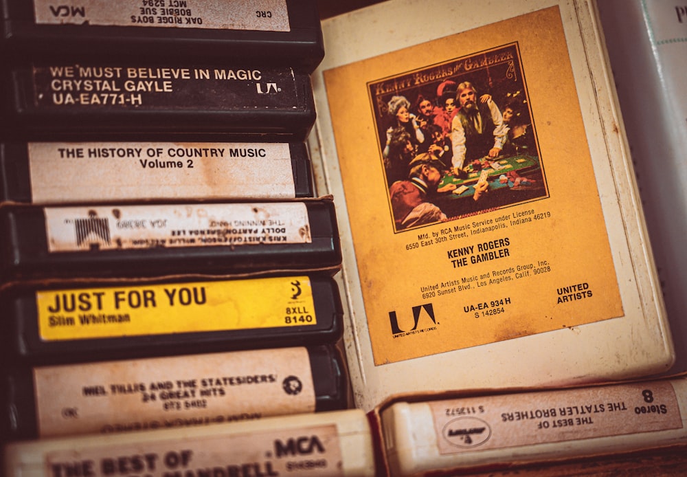 a stack of cassettes sitting on top of a table