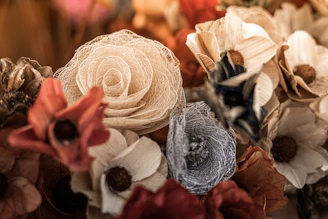 a bunch of flowers that are sitting on a table