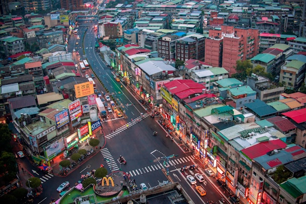 Aerial shot of a cityscape highlighting strategic placements of LED advertising panels.