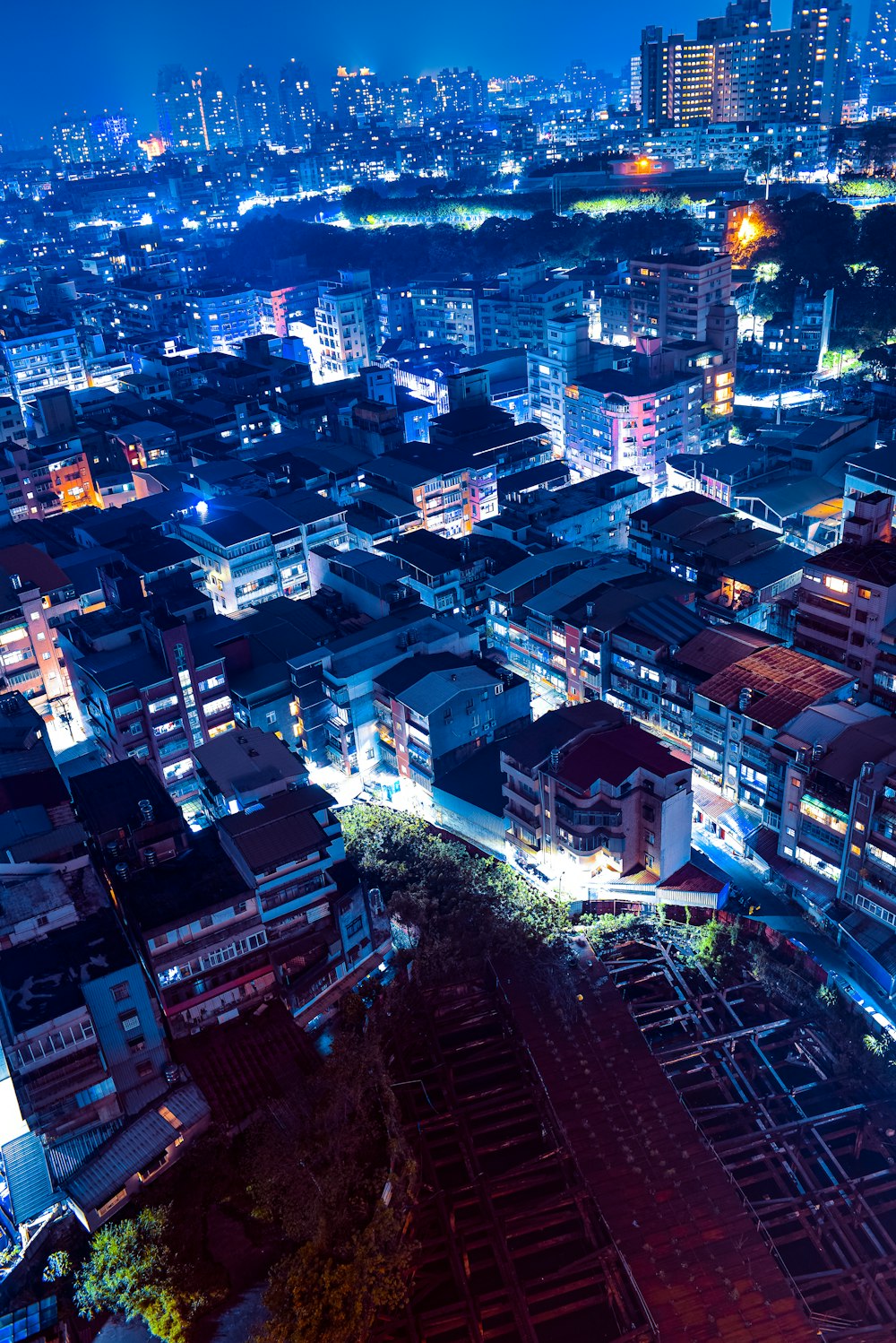 an aerial view of a city at night