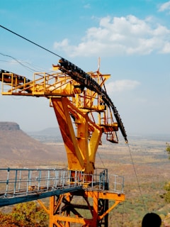Wide shot of a large steel support structure assembled outdoors at a mining site
