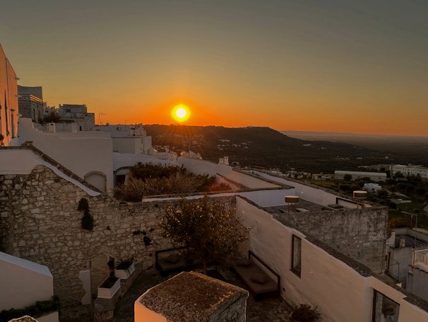 Sunset view of the synagogue building surrounded by olive trees in the village of Ali Zahav.