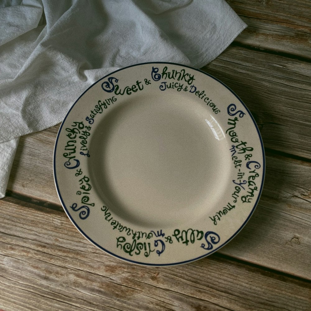 a white plate with green writing on it