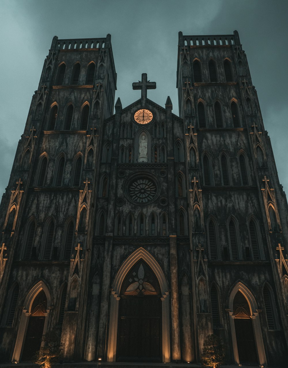 a large cathedral with a clock on the front of it