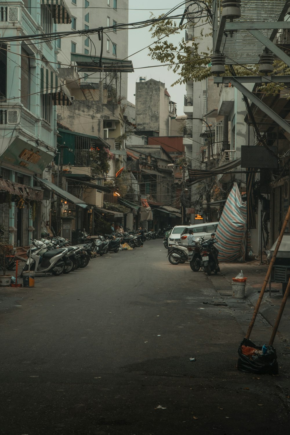 a city street filled with lots of tall buildings