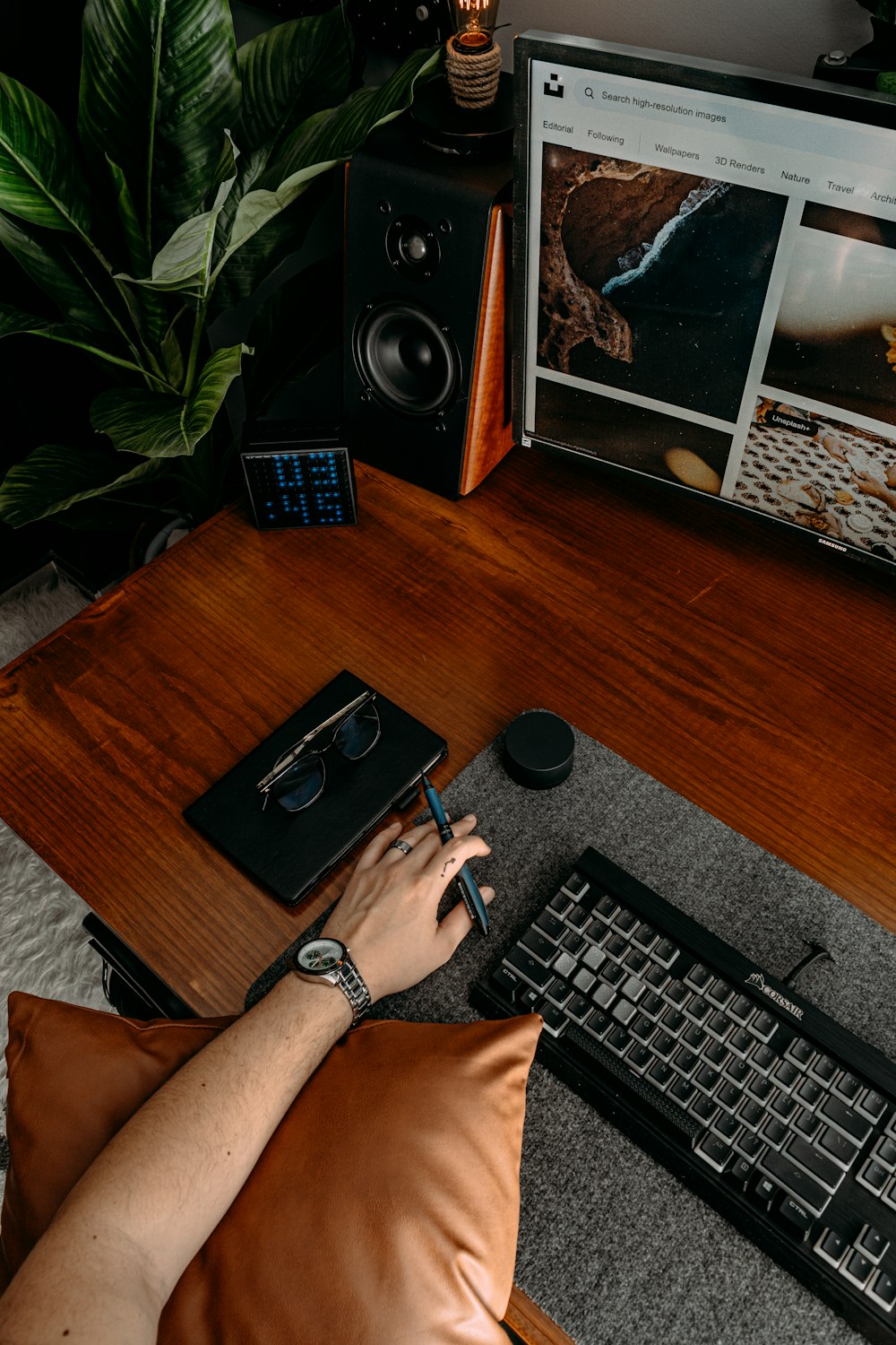 a person is typing on a computer keyboard