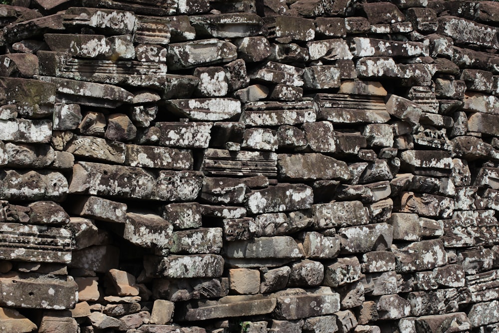 a stone wall made of bricks and cement