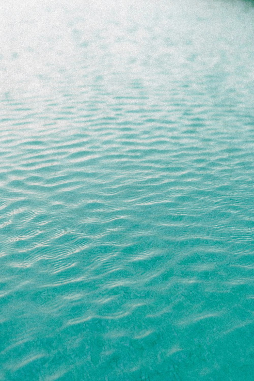 a boat floating on top of a body of water