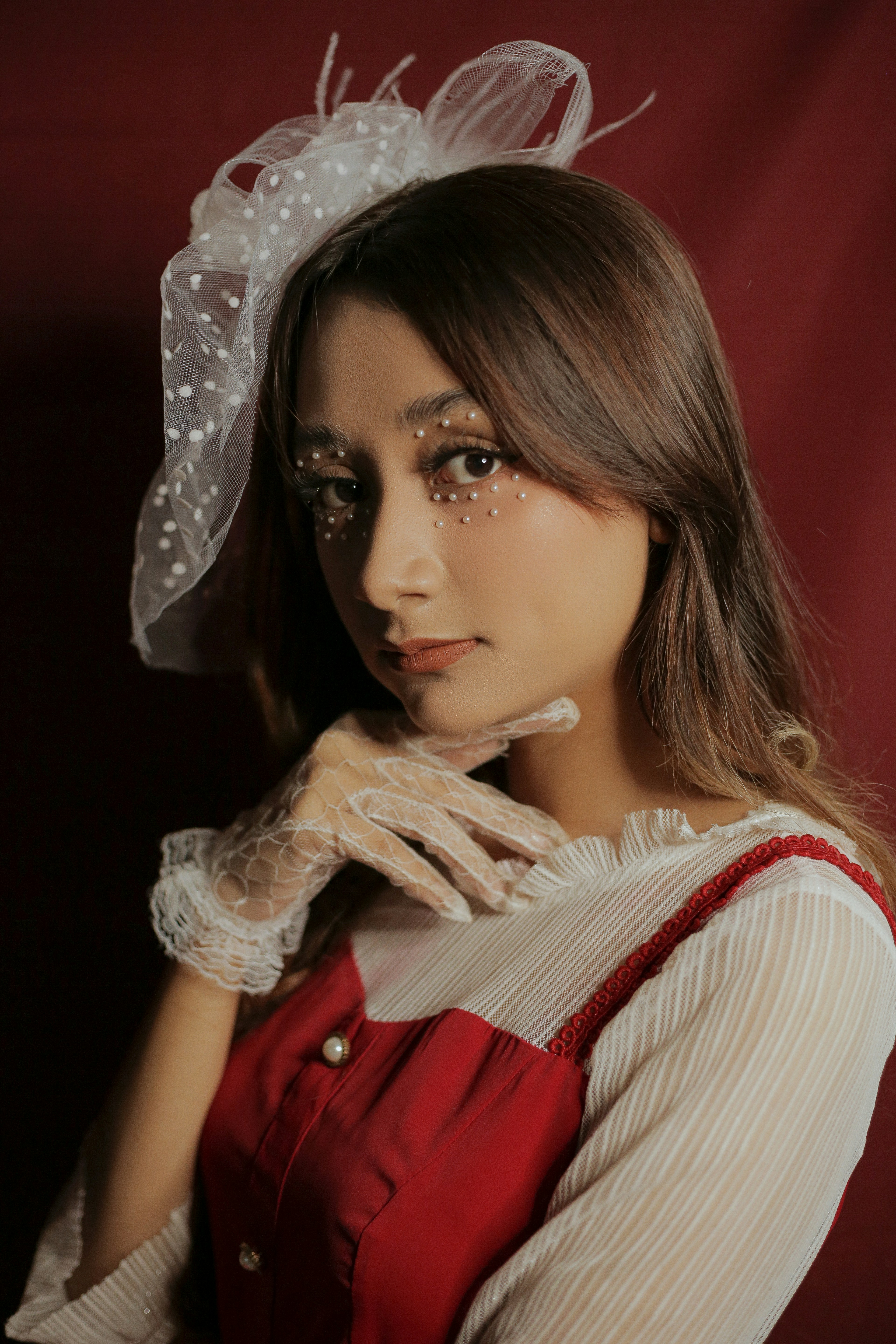 A woman wearing a white veil and red dress photo – Free Woman Image on ...