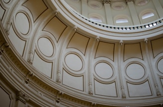 the ceiling of a building with a circular ceiling