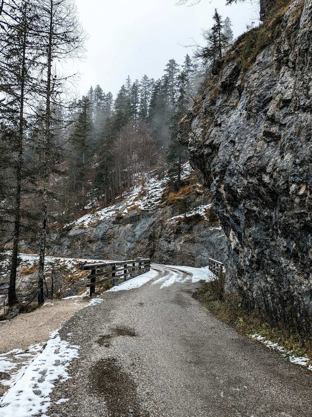 a road that is next to a cliff