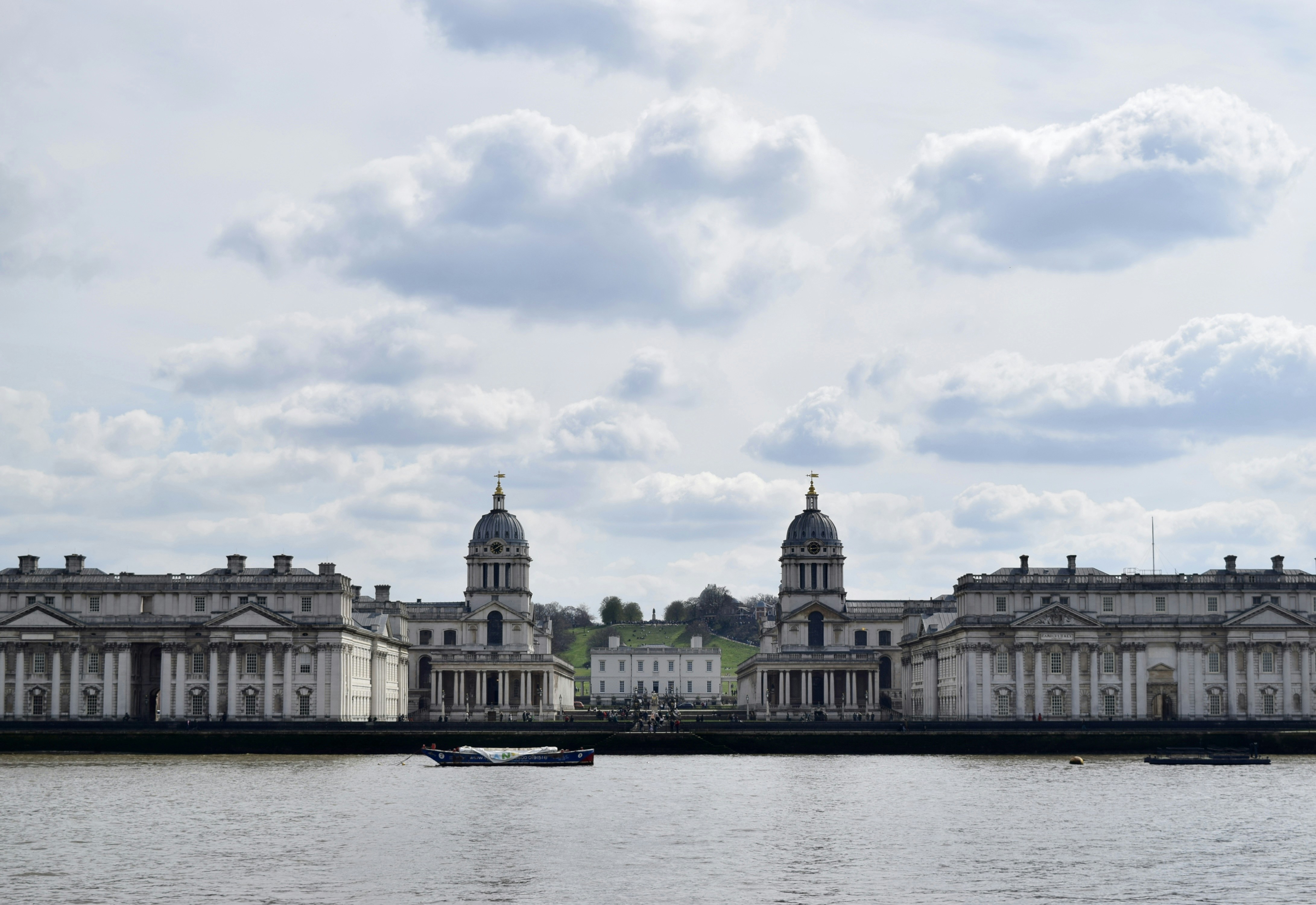 a large building sitting on top of a lake
