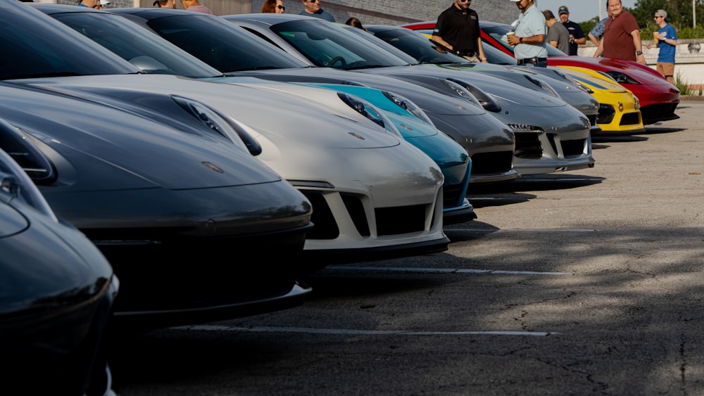 a row of cars parked in a parking lot