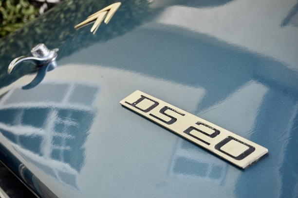 A close-up of a Citroën car with a 'Sold' sign on it.
