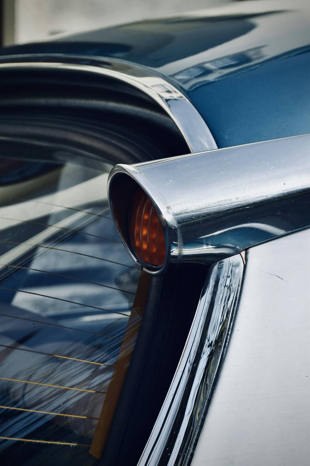 a close up of the tail light of a car