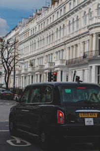 A clean, modern minicab parked outside 9b Mill Bank in Wellington.