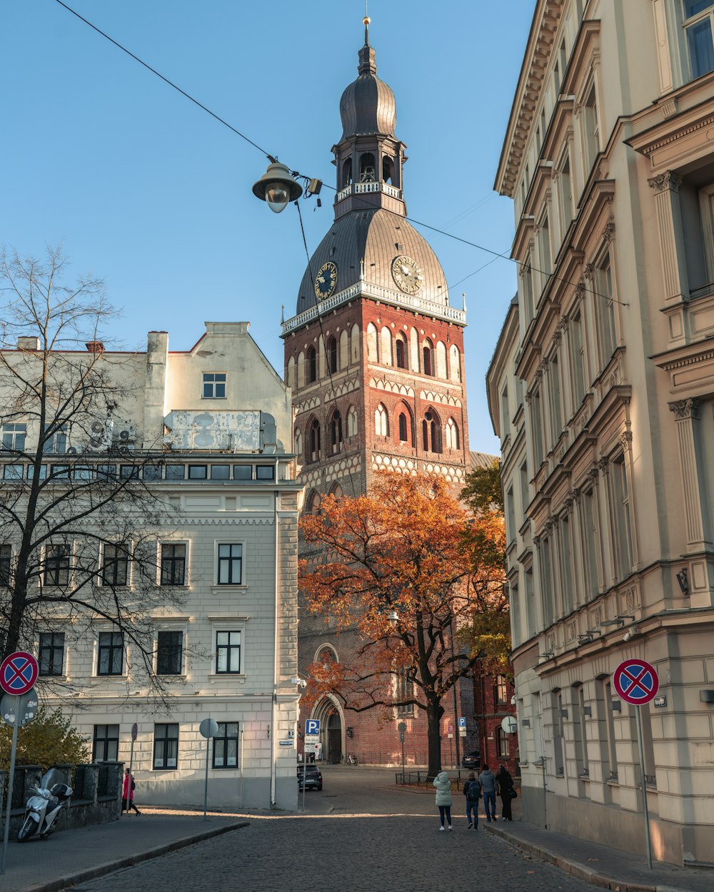 a tall building with a clock on the top of it