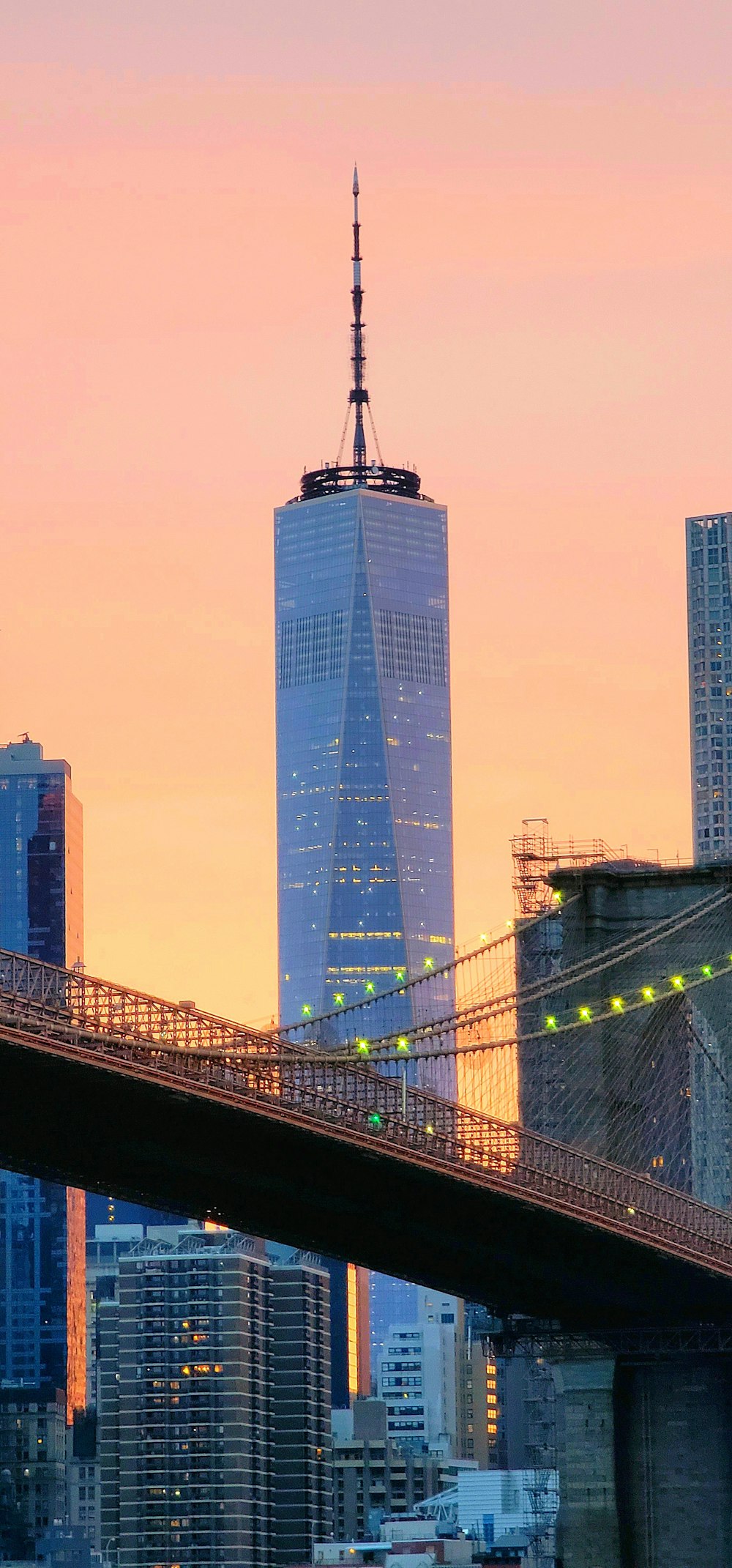 a view of a bridge with a building in the background