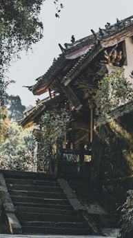 A peaceful retreat space nestled in lush greenery with Indian architectural elements.