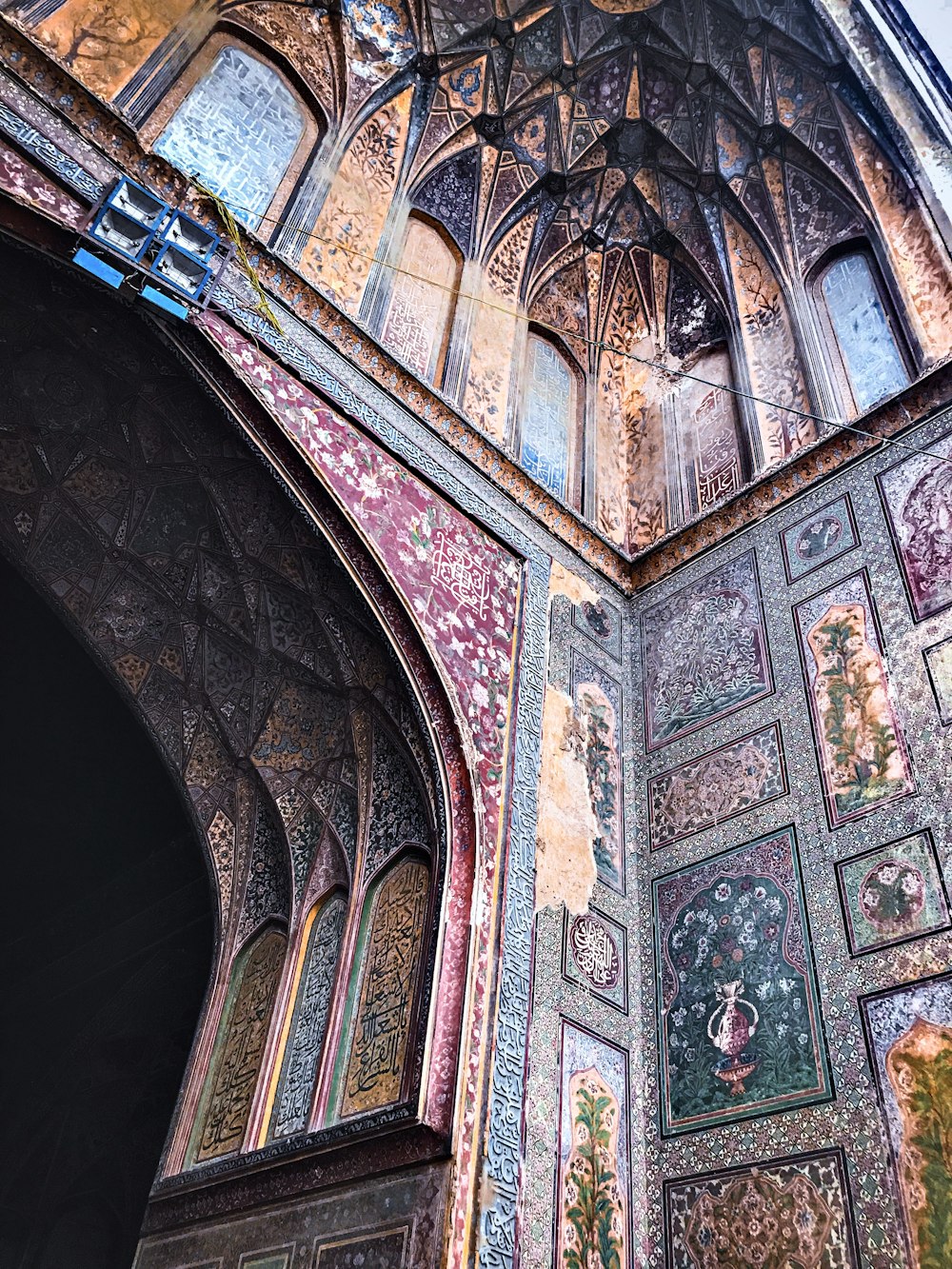 a very ornate building with a lot of paintings on it