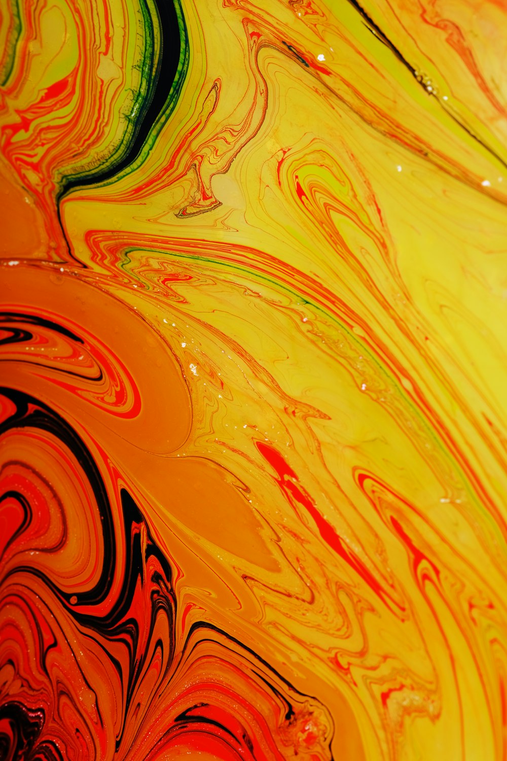 a close up of a yellow and red liquid