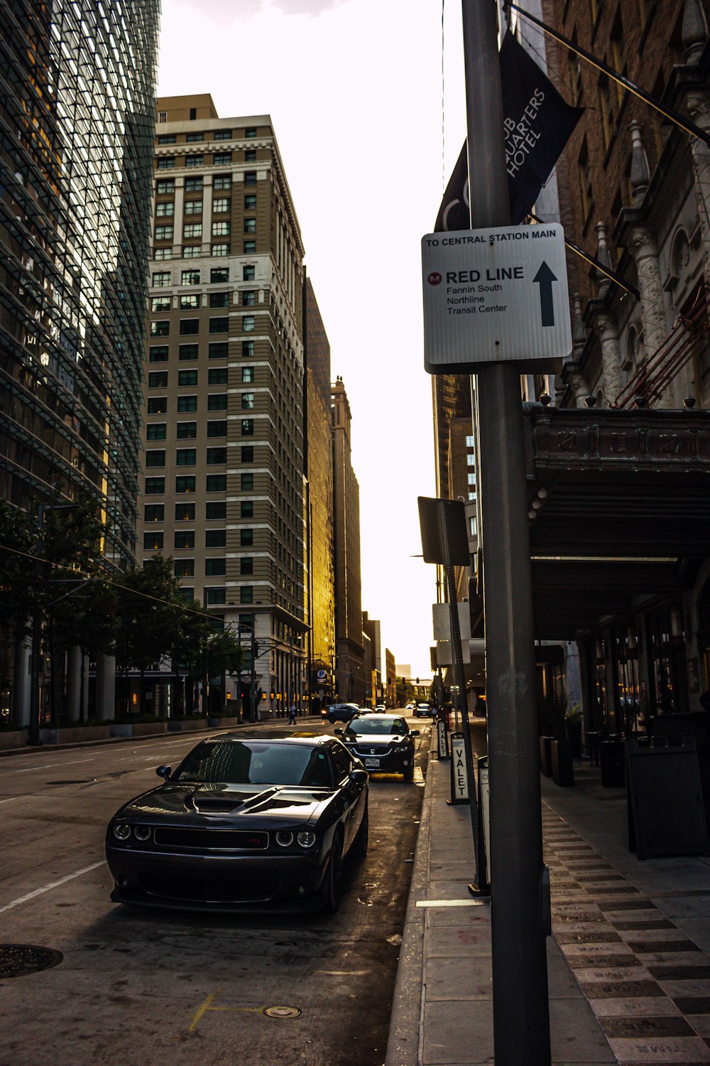 a city street filled with lots of tall buildings