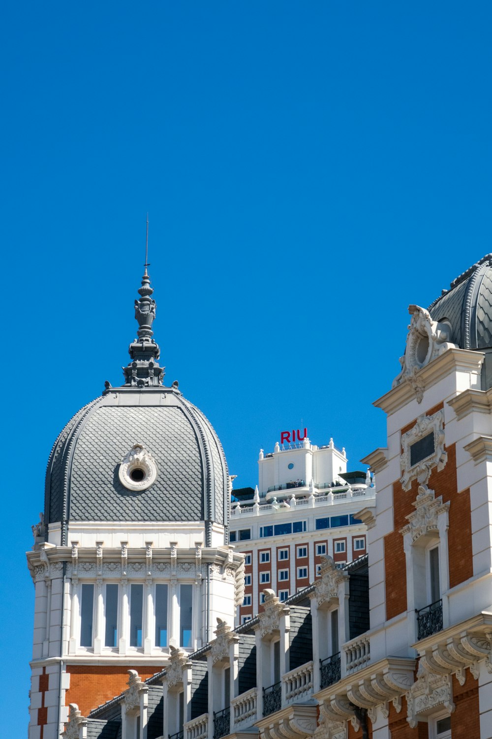 a large building with a clock on the top of it