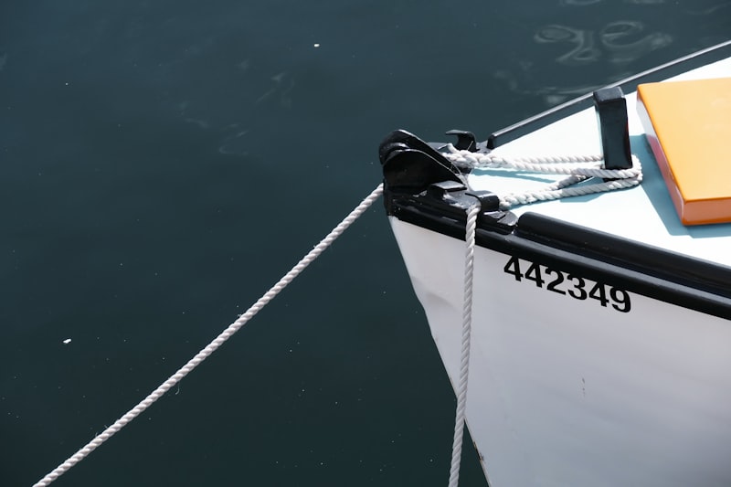 a close up of a boat tied to a dock
