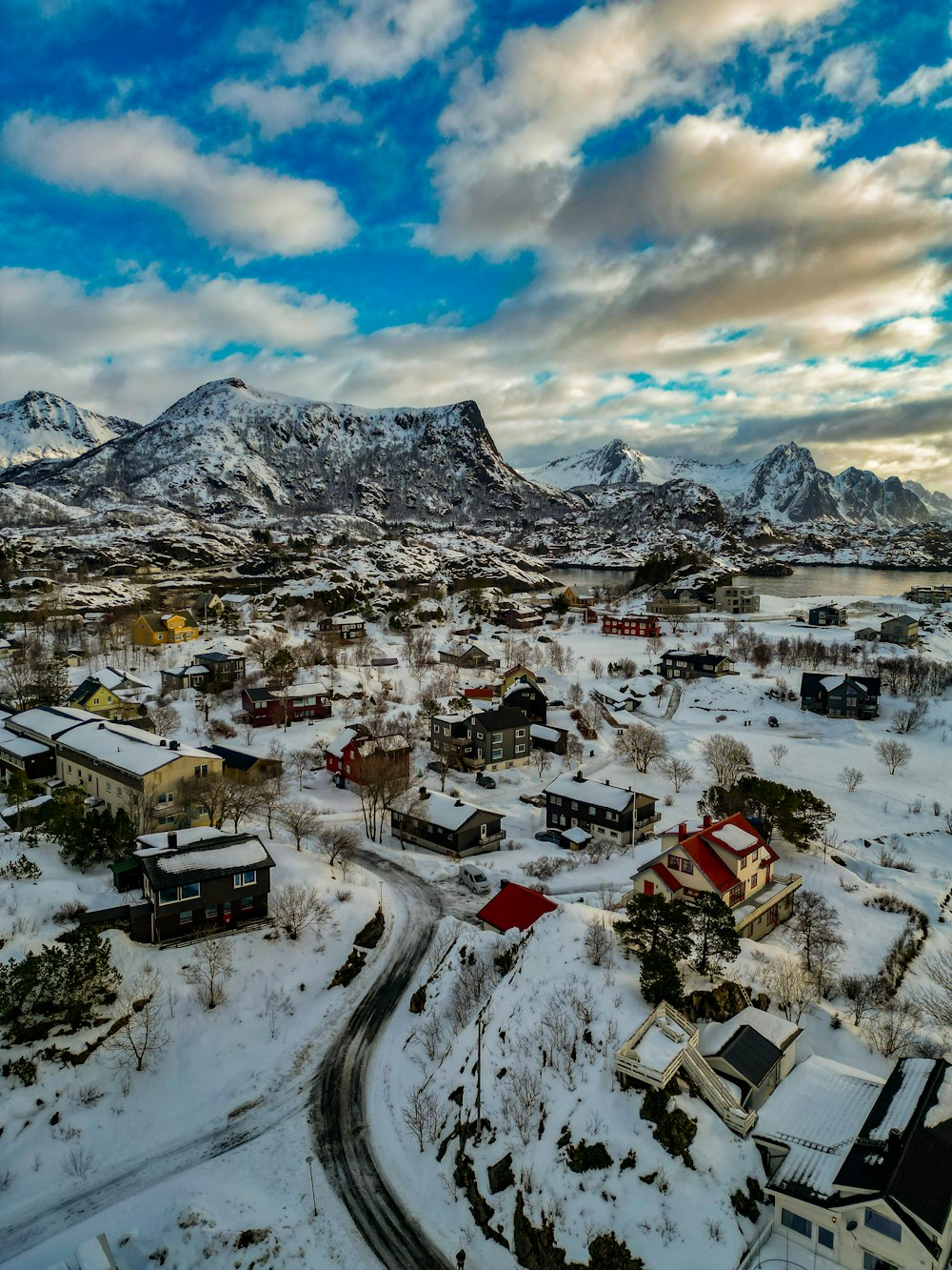 an aerial view of a small town in the mountains