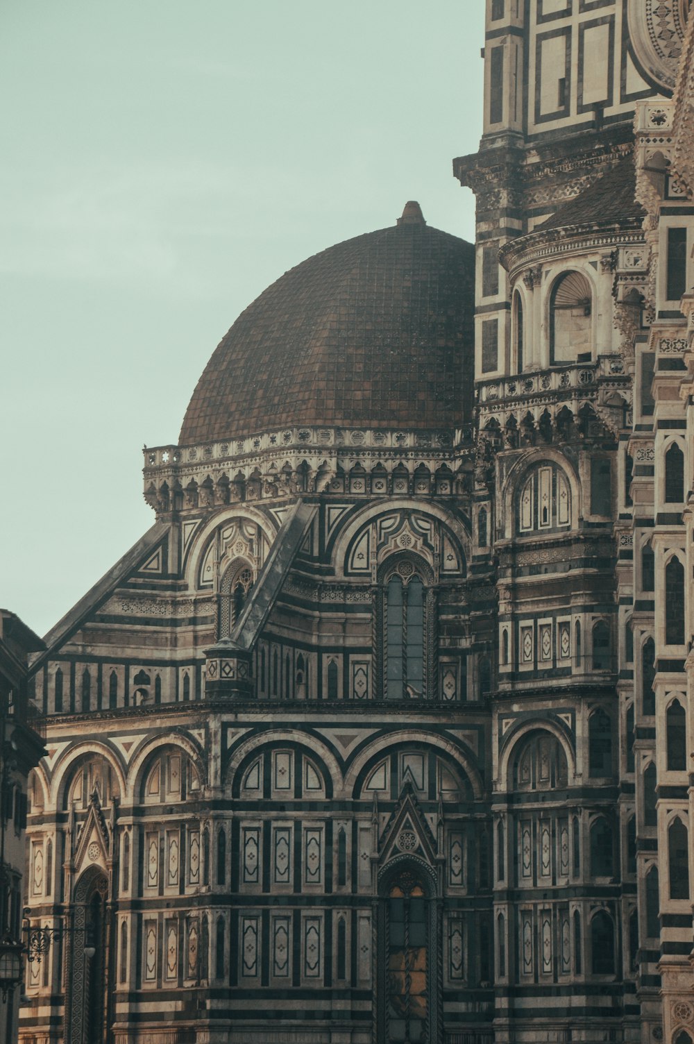 a large building with a clock on the top of it