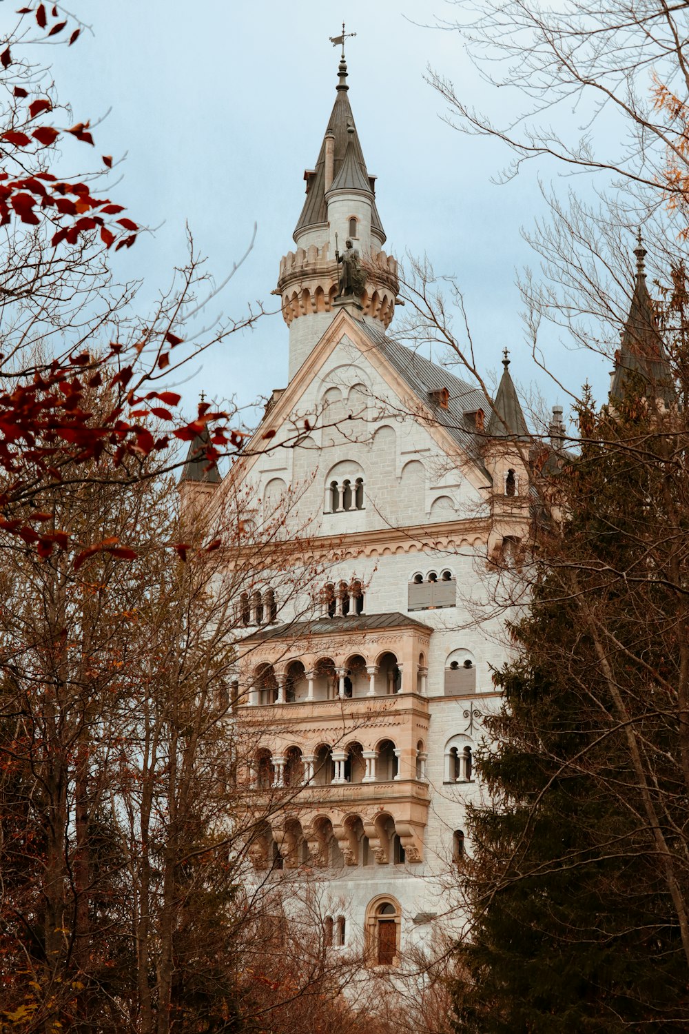 a tall building with a clock on the top of it