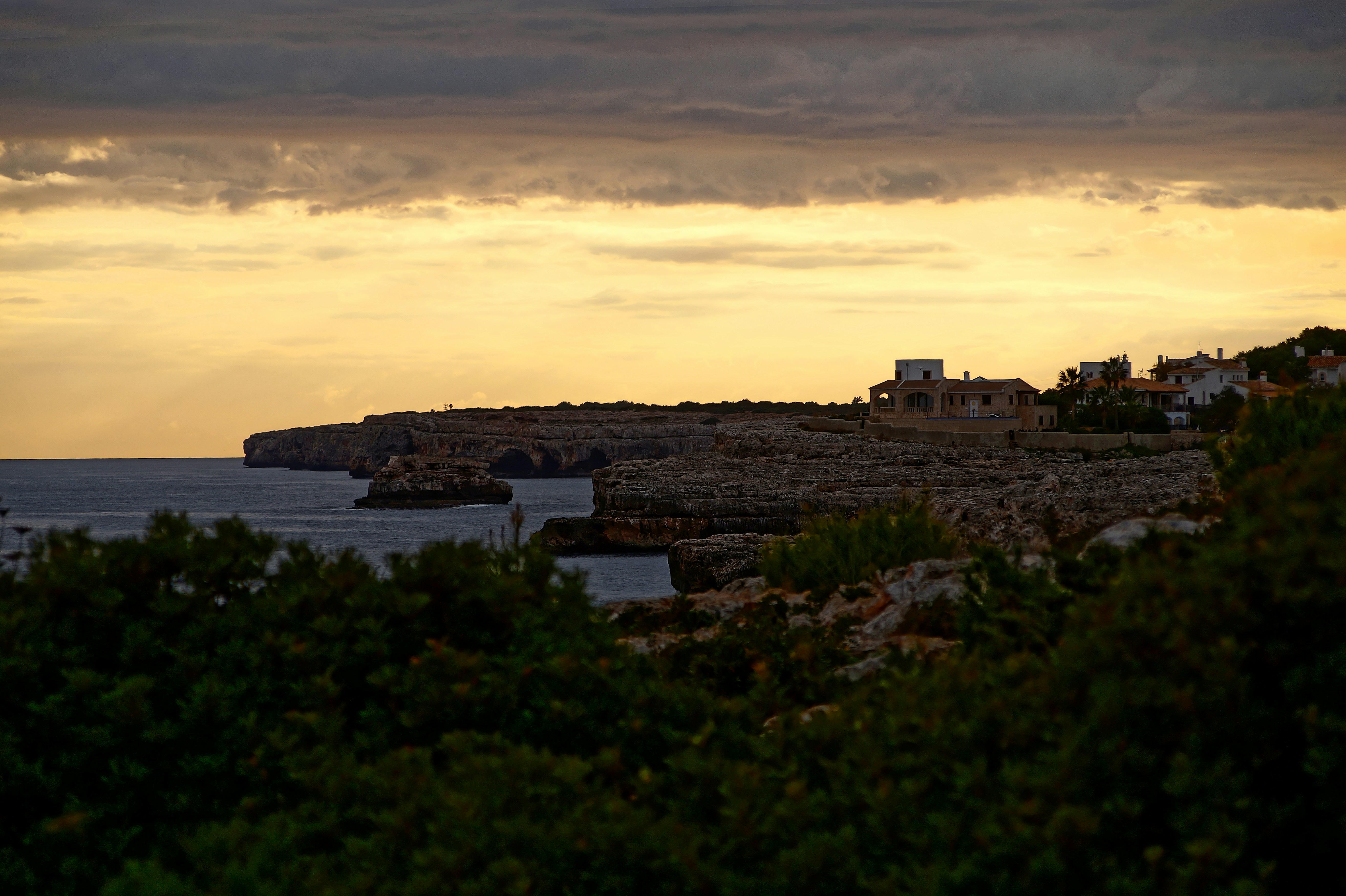 a view of a body of water at sunset