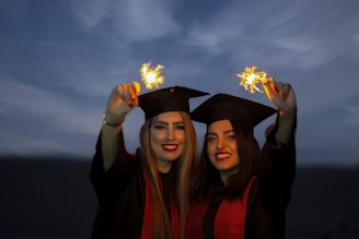 Students celebrating after passing their driving tests.
