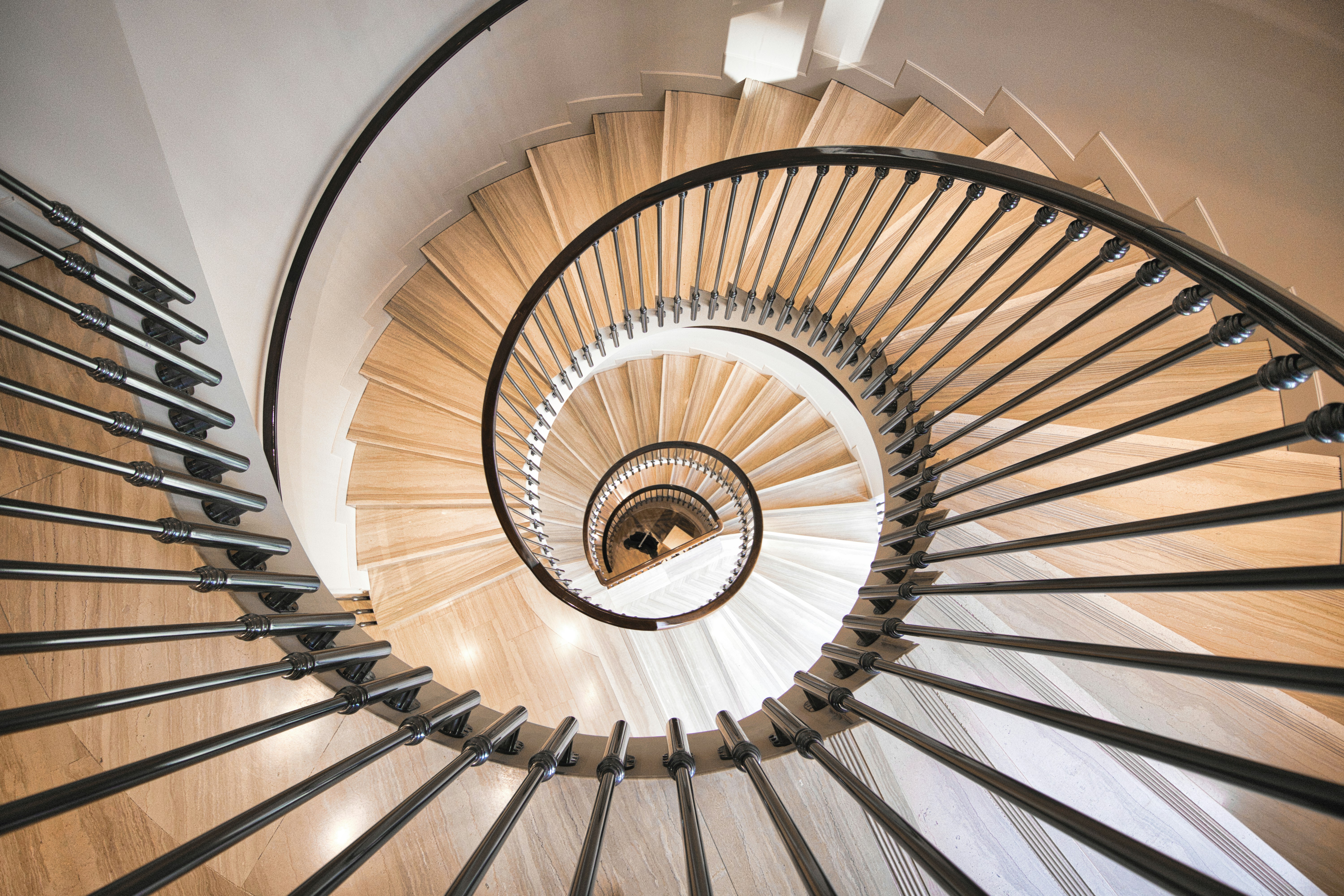 a view of a spiral staircase from the top