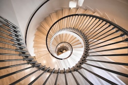 a view of a spiral staircase from the top