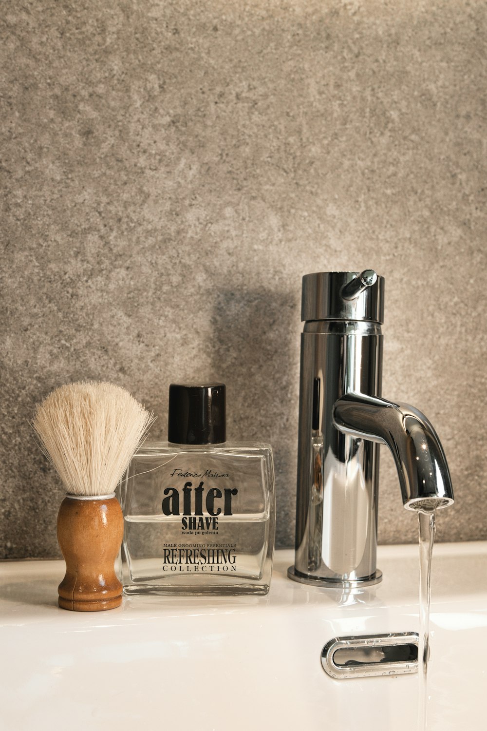 a shaving brush, soap dispenser, and soap dispense
