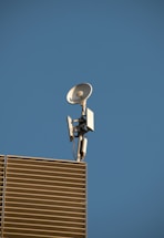 An image of a satellite tracking device in a modern setting.