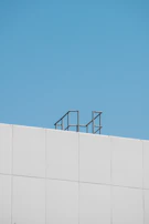 Exterior shot of the Top Access Solutions building under clear blue skies.