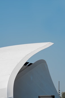 A sleek 40ft modular unit set against a clear blue sky, showcasing clean lines and modern design.