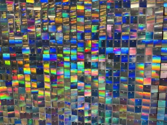 Abstract puzzle game interface with colorful tiles and dynamic animations.